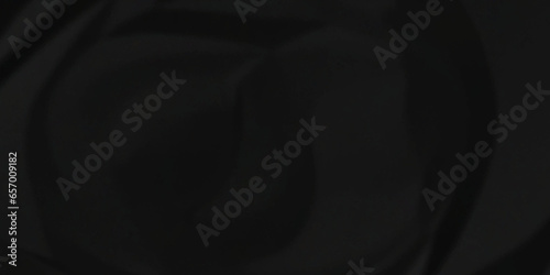 Crumpled paper texture. black crumpled paper texture. top view. crush paper so that it becomes creased and wrinkled. Old black crumpled paper sheet background texture.	