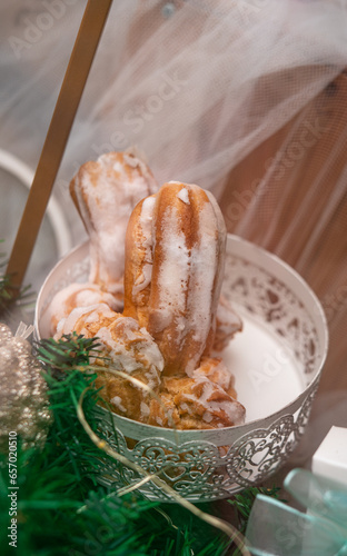 Traditional portuguese pastry in the shape of penis on festival of st. Gonsalo in Amarante city photo