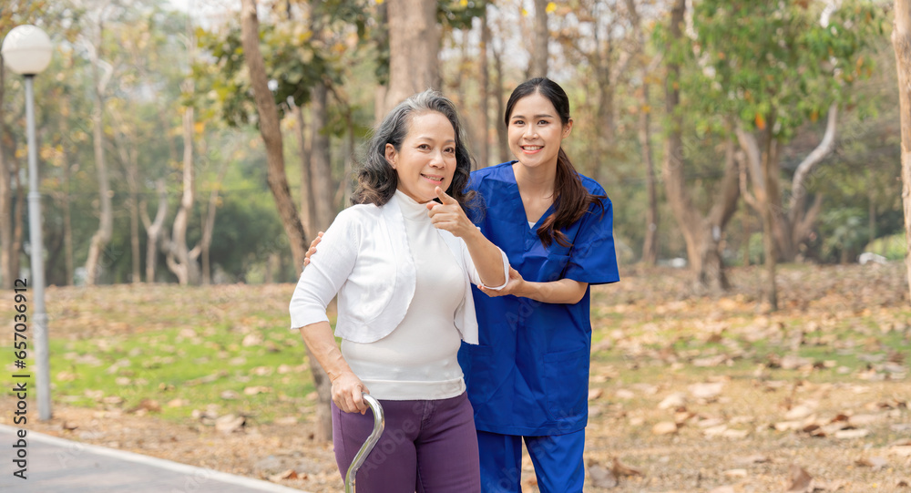 Nurse and senior in elderly care, support or walking with stick at park. Medical caregiver or therapist help patient or person with a disability in retirement or physiotherapy Nurse and senior in elderly care, support or walking with stick at park. Medical caregiver or therapist help patient or person with a disability in retirement or physiotherapy