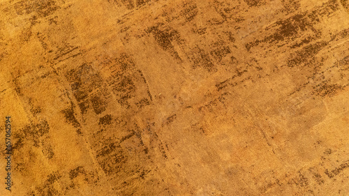 Wallpaper Mural Aged surface with leftovers of paint as background closeup. Grungy texture of wall with weathered stucco layer upper view. Rough plate covered with old plaster material as wallpaper Torontodigital.ca