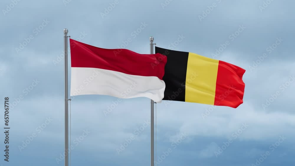 Belgium flag and Indonesia flag waving together on cloudy sky, endless seamless loop, two country relations concept Belgium flag and Indonesia flag waving together on cloudy sky, endless seamless loop, two country relations concept