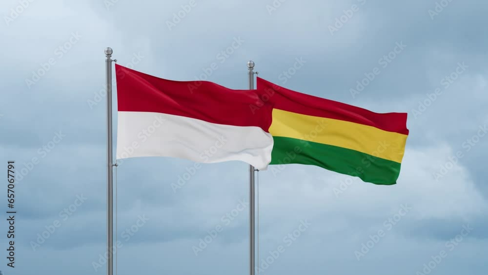 Bolivia flag and Indonesia flag waving together on cloudy sky, endless seamless loop, two country relations concept Bolivia flag and Indonesia flag waving together on cloudy sky, endless seamless loop, two country relations concept