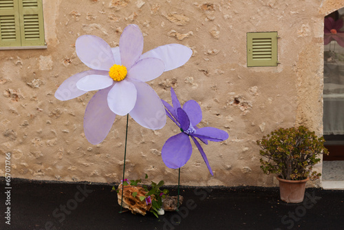 Big violet textil flower decorations on "Costitx en Flor" (Costitx in bloom) Flower Fair, Majorca, Spain