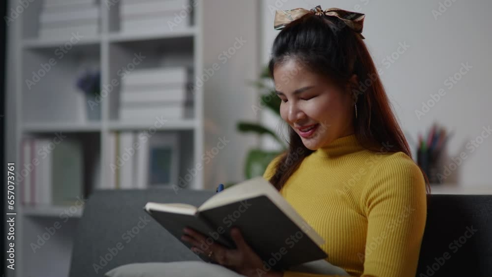 Yellow sweater woman thinking and get ideas for creating and writing on the book. classroom home school in living room. Yellow sweater woman thinking and get ideas for creating and writing on the book. classroom home school in living room.