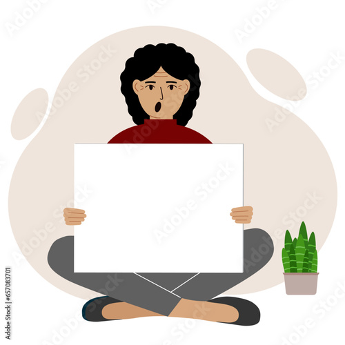 A woman sits cross-legged and holds a large white sheet with space for text. Advertising, poster, information, announcement. photo