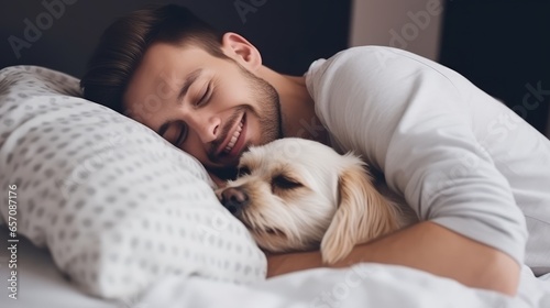 dog sleep with his owner in bed