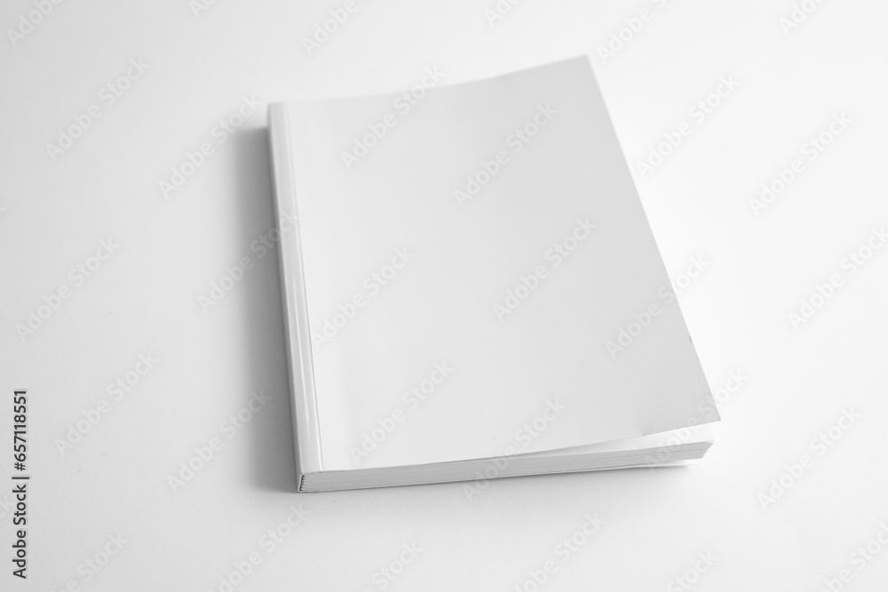 White. Paperback Notebook Mockup of white book, notebook, copybook, blank notepad cover on white ...