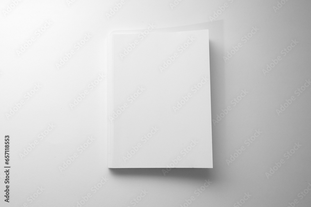 White. Paperback Notebook Mockup of white book, notebook, copybook, blank notepad cover on white ...