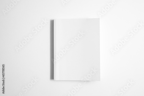 Mockup of white book, notebook, copybook, blank notepad cover  on white background. Layout mock up ready for your design preview.