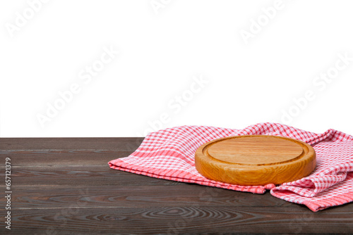 Cutting board with napkin on wooden table with isolated background.Handmade cutting board wood cutting board. Wooden board on a white background. MOCKUP. Design.