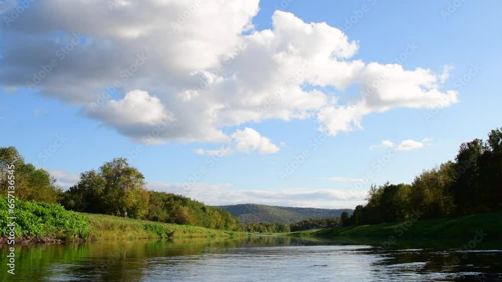 Autumn foliage river valley parkland selective focus video wide view perspective, sunny fall day real time video Autumn foliage river valley parkland selective focus video wide view perspective, sunny fall day real time video