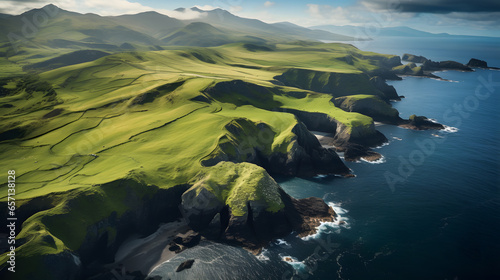 Soar above the Scottish coastline and capture the breathtaking view of rolling hills meeting the sea. This aerial perspective showcases awesome coastal landscapes from above.