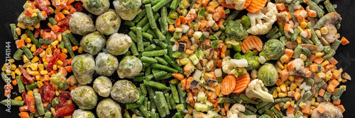 Frozen vegetable mix banner, frozen green beans and broccoli, corn and carrots, brussels sprouts and cauliflower, peas and bell peppers, eggplant and zucchini, top view