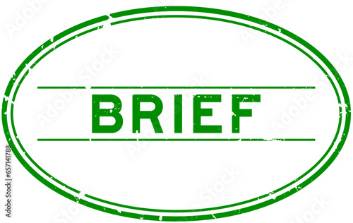 Grunge green brief word oval rubber seal stamp on white background
