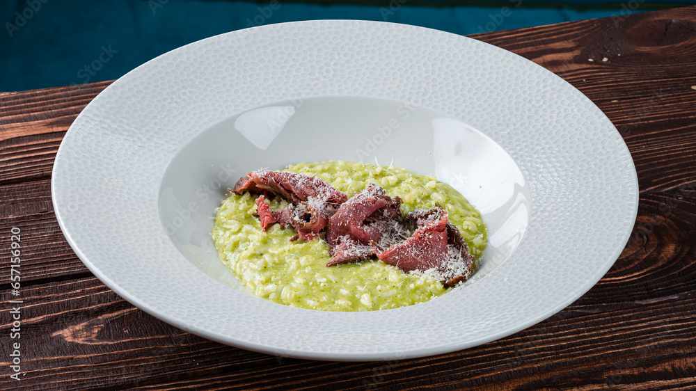 Italian risotto with beef and parmesan cheese. Italian risotto with beef and parmesan cheese.