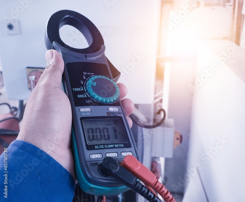 Obraz na plátne Multitester current pliers for measuring instrument ,concept  electrical repair and service