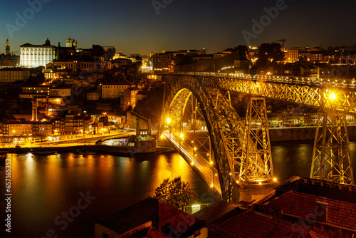 The Dom Luís I Bridge or Luís I Bridge, is a double-deck metal arch bridge that spans the River Douro between the cities of Porto and Vila Nova de Gaia in Portugal. © Carlos