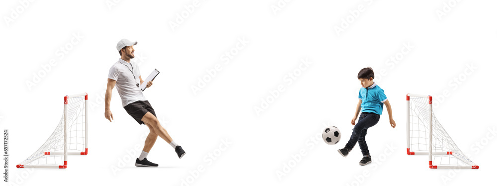 Football coach training football with a boy Football coach training football with a boy