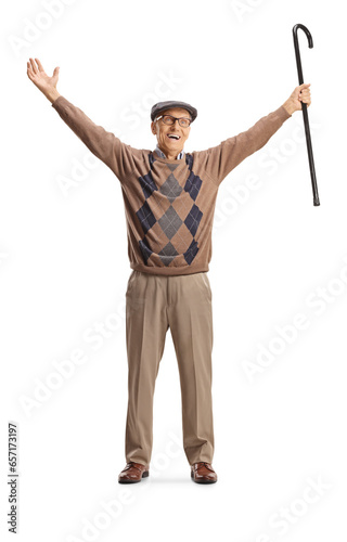 Happy elderly man raising a walking cane