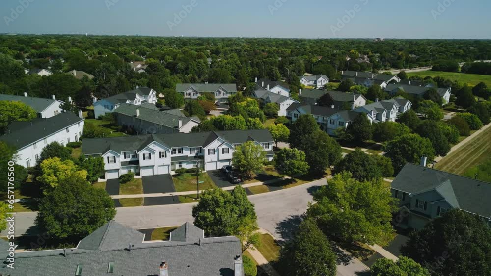 Drone view of american new suburb at summertime. Establishing shot of neighborhood. wide aerial footage Drone view of american new suburb at summertime. Establishing shot of neighborhood. wide aerial footage