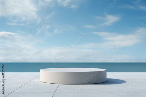 Abstract minimalist podium stage with round pedestals for product presentation against blue sky background and seas