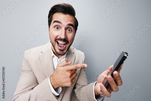 phone man smile smartphone call business gray hold portrait suit happy