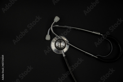 black stethoscope on white background