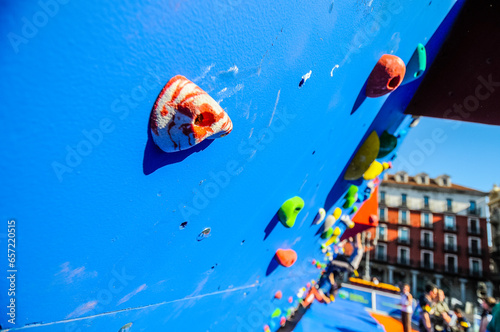 Details of a climber showed in detail as they take part in a competition in an artificial wall in Valaldolid, Spain