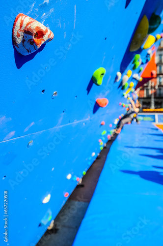 Details of a climber showed in detail as they take part in a competition in an artificial wall in Valaldolid, Spain