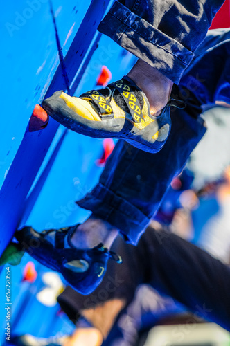 Details of a climber showed in detail as they take part in a competition in an artificial wall in Valaldolid, Spain