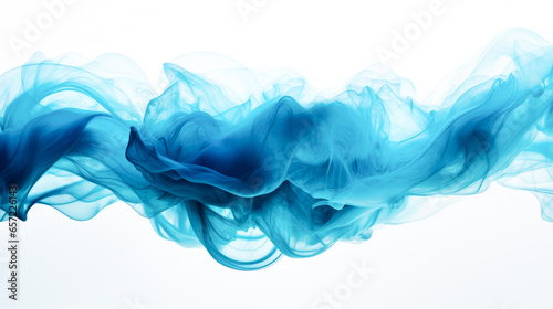 Blue ink in water on white background. Abstract background. Close up.