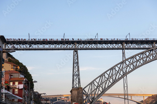 People on the Dom Luis I bridge, Porto, Portugal © Ana