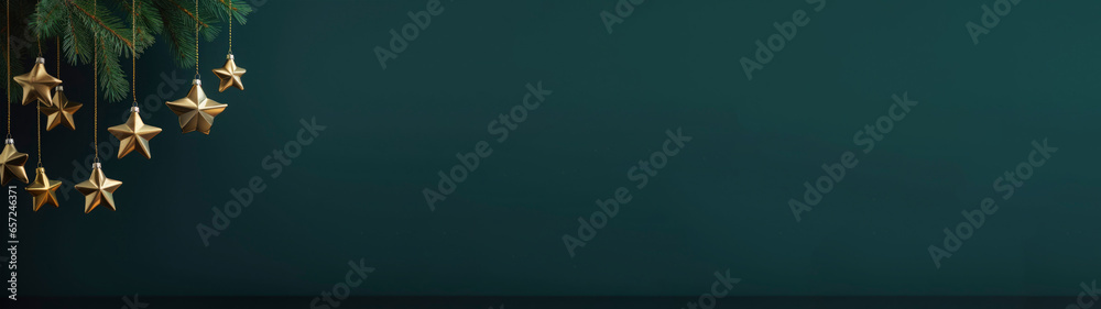 Fototapeta premium Christmas, advent, winter, christmas items with golden hanging stars and branches on dark green background, with space for design or text