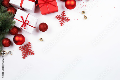 White background with Christmas decorations, perfect for adding text. Seen from above.