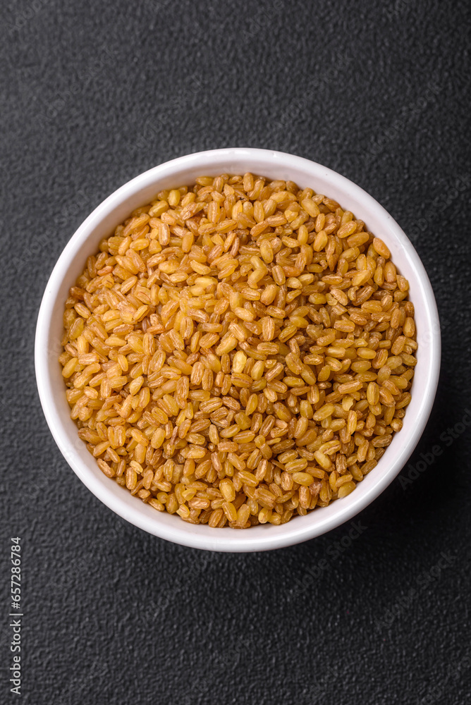 Raw bulgur wheat porridge as an ingredient for preparing a delicious dish Raw bulgur wheat porridge as an ingredient for preparing a delicious dish
