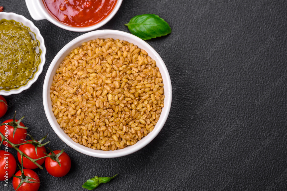 Raw bulgur wheat porridge as an ingredient for preparing a delicious dish Raw bulgur wheat porridge as an ingredient for preparing a delicious dish