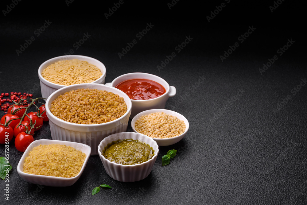 Raw bulgur wheat porridge as an ingredient for preparing a delicious dish Raw bulgur wheat porridge as an ingredient for preparing a delicious dish