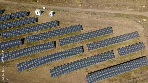 Eco-Friendly Innovation: Aerial Perspective of a Solar Power Project. photo