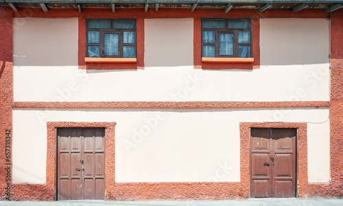 Street view of the facade of an old colonial building, architecture background, Ecuador.