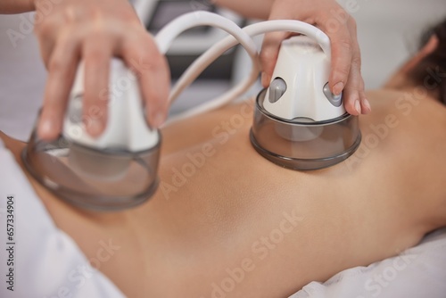 beauty centre, Doctor cosmetologist, Applying vacuum. In medicine salon, range of therapeutic treatments such as vacuum body massage, problem area slimming, body care professional equipment, lpg photo