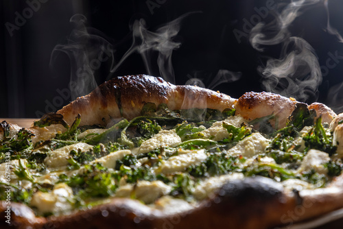 Close-up of hot broccoli and cheese pizza