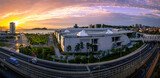 Yeosu City skyline, buildings, gardens and harbor along the curving coastal overpass highway in Jeollanam-do, South Korea, panoramic cityscape at sunrise
