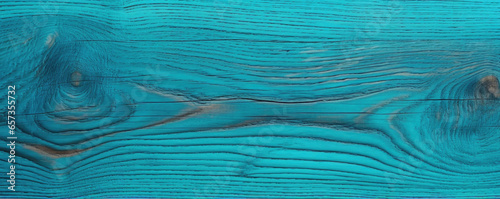 Closeup of a vibrant turquoisestained pine wood, with a slightly rough and textured surface.
