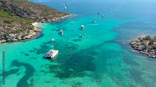 Splendid bay with turquoise water and boats anchored at anchor, aerial shots
