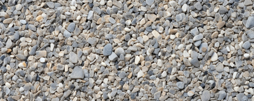 Texture of exposed aggregate concrete A modern and sleek surface with a mix of small, shiny pebbles and glass beads. The surface has a glossy finish, creating a sleek and polished appearance. Texture of exposed aggregate concrete A modern and sleek surface with a mix of small, shiny pebbles and glass beads. The surface has a glossy finish, creating a sleek and polished appearance.