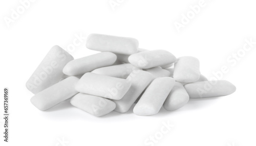 Pile of tasty chewing gums on white background