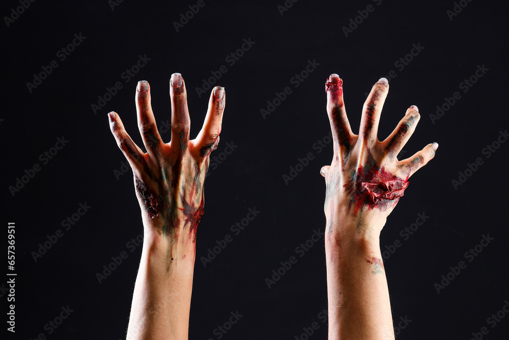 Zombie hands on black background. Halloween celebration