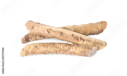 Fresh cut horseradish roots isolated on white, top view