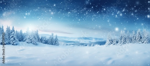 Enchanting ultrawide image showcasing the delicate dance of snowflakes as they fall gently over the untouched snowdrifts © diego
