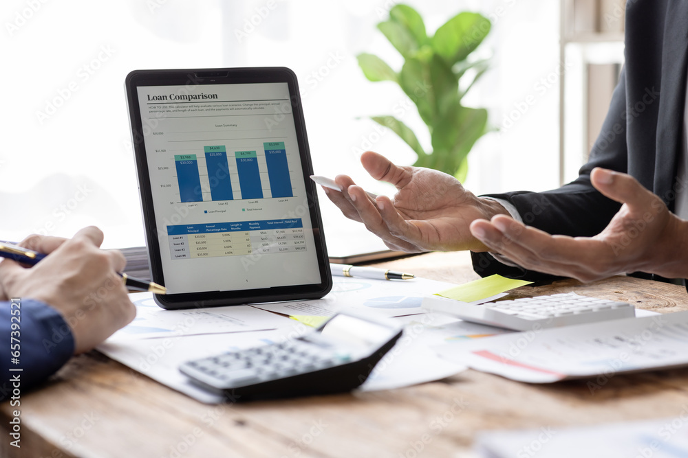 Financial Business team analyze the graph of the company's performance to create profits and growth, Market research reports and income statistics, Financial and Accounting concept. Financial Business team analyze the graph of the company's performance to create profits and growth, Market research reports and income statistics, Financial and Accounting concept.
